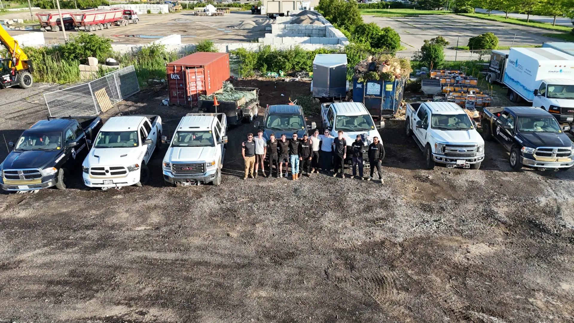 MJ Landscapers crew and fleet lined up in the company yard, seen from above
